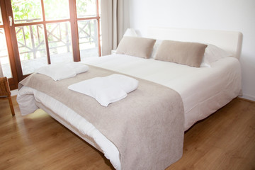 Fototapeta na wymiar Double Bed In Interior design modern Bedroom tone warm