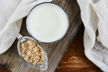 sesame milk sesame seed in a glass on wooden background, concept of healthy eating, organic food, gluten-free and aslacton vegetable milk.