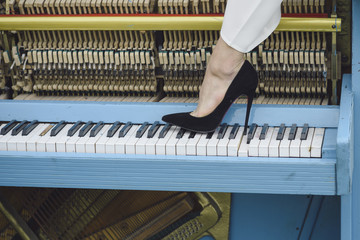 piano and sexy legs, musical style, grunge instrument.