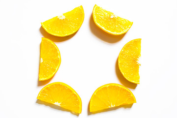 Slices of orange isolated on white background. top view;