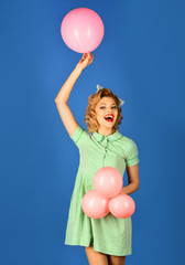 Pin up woman in balloons, birthday.