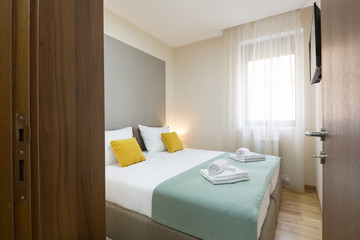 Interior of a hotel bedroom with double bed