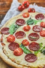 Tasty Pizza With Tomato Sauce, Pepperoni Sausage, And Mushrooms On Wooden Background Natural Rustic, A Pizza Cutter And Ingridienty.