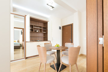 Interior of a hotel apartment, dining area