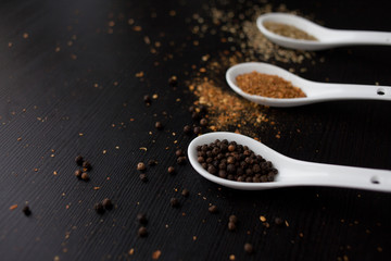 Set spices in measuring spoon. Cooking and seasoning for taste