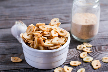 Garlic chips, natural organic seasoning close up