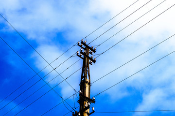 Electric pylon and bright sky