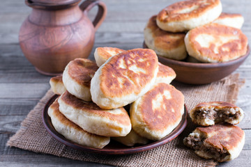 Patties with potatoes and meat. Traditional Russian food.