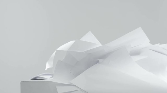 Blank paper sheets falling down