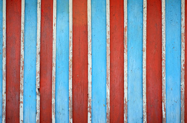  Texture of multi-colored wooden fence boards. Old colorful wall background.