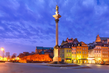 Fototapeta na wymiar Castle Square with Royal Castle, colorful houses and Sigismund Column called Kolumna Zygmunta in Old town during morning blue hour, Warsaw, Poland.