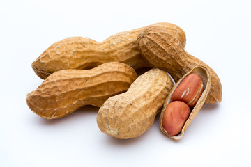 Dried peanuts on the white background.