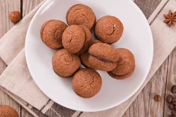 Hazelnut shortbread sandwiches filled with chocolate cream.