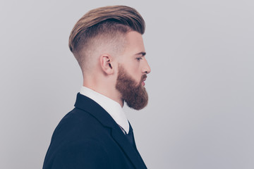 Half-faced cropped close up portrait of serious strict pondering thinking pensive confident focused...