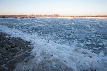Ice blocks over the frozen river