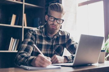 High-school campus nerd intelligence leadership people copybook notepad concept. Portrait of concentrated focused intellectual stylish brutal calm student doing hometask in cafe drinking tea