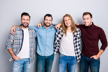 International men's day. Community fellowship brotherhood brothers university meeting concept. Portrait of cheerful excited dreamy guys, hugging shoulders, checkered shirt, isolated on gray background