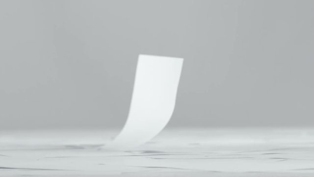 Blank paper sheets falling down