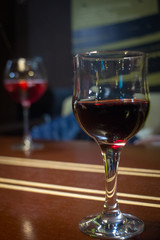 Pouring red wine into the glass