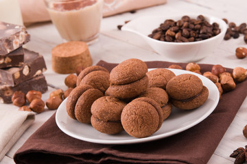 Hazelnut shortbread sandwiches filled with chocolate cream.