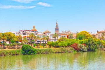Fototapeta na wymiar View on downtown of Seville and Guadalquivir River Promenade.