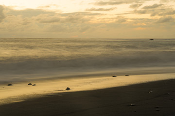 Sunset at the beach "El Charco Verde" between Puerto Naos and El Remo at La Palma / Canary Islands