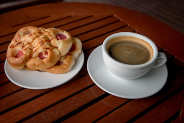 hot coffee hot tea and bread on wooden table