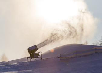 Snow cannon in a ski resort in winter