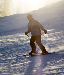 A man skiing in a ski resort