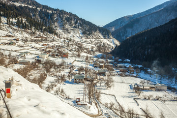 Mountain village in the Caucasus Mountains in winter, Svaneti, Georgia
