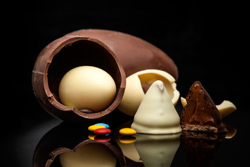 Easter chocolate eggs on a black background