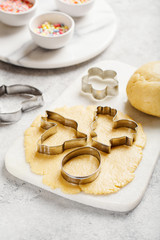 Dough for easter cookie and cutters for the cookies,