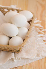 white eggs in a basket
