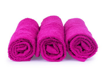 Pink towel isolated on a white background