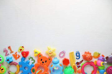 Children's toys and accessorieson a White background.view from above