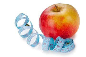 blue measure tape and red apple  isolated