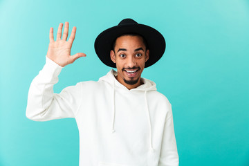Portrait of a smiling young afro american man in hat © Drobot Dean