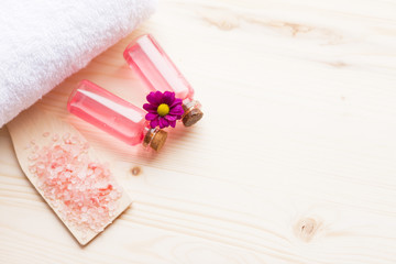 Spa and natural cosmetic concept. Composition of spa treatment for beauty and skincare on the wooden background. Top view. Close up.