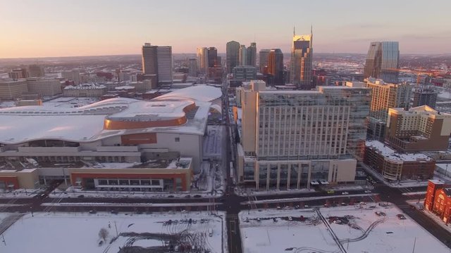 Nashville Snow- City skyline pan over to stadium