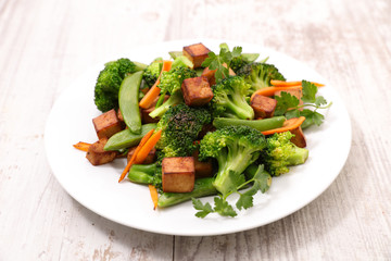 fried tofu and vegetable cooked with soya sauce