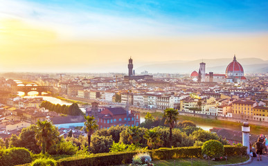 A fabulous panoramic view of Florence from Michelangelo Square at sunset. It is a pilgrimage of tourists and romantics. Duomo Cathedral. Italy, Tuscany