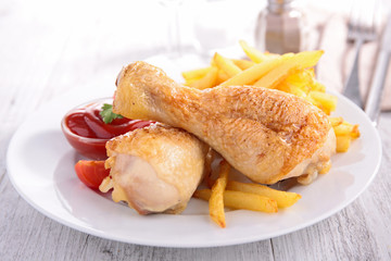 chicken leg and french fries