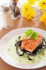 Black fettucine white sauce