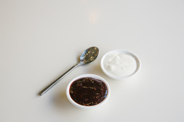 two sauces and a spoon