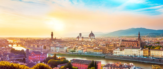 Fototapeta na wymiar Beautiful magical optimistic landscape fabulous panoramic view of Florence from Michelangelo Square in in sunset. It is a pilgrimage of tourists and romantics. Duomo Cathedral. Italy, Tuscany.