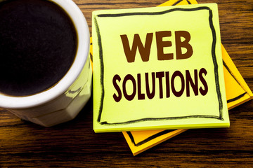Handwritten text showing Web Solutions. Business concept for Internet Design Plan written on sticky...