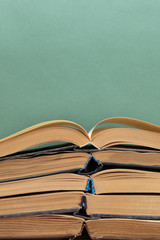 old books on a wooden shelf
