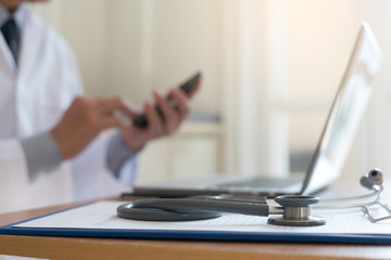 Doctor working on laptop computer
