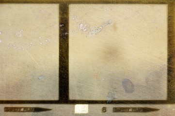 Vintage squared film strip frame in sepia tones.