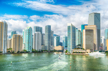 Fototapeta na wymiar Aerial view of Miami skyscrapers with blue cloudy sky